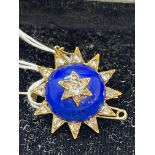 Jewellery: Georgian brooch in the form of a star, blue enamel centre and set with rose cut diamonds,