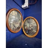 Early 20th cent. Oval frames with convex glass depicting stylised printed Tudor scenes, a pair.