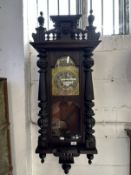 Clocks: Art Nouveau regulator with brass face and stylised spandrels. 43ins.