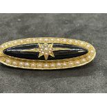 Jewellery: Yellow metal Victorian oval mourning brooch set with onyx and pearls, back having a