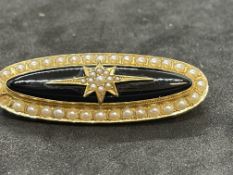 Jewellery: Yellow metal Victorian oval mourning brooch set with onyx and pearls, back having a