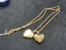 Hallmarked Jewellery: 9ct gold barley corn link chain with two heart lockets attached. Length 18ins.