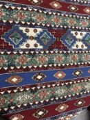 Carpets/Hangings: Late 19th/early 20th cent. Possibly Ottoman multicoloured ground, two thin borders