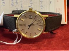 Watches: Gentleman's gold plated Omega with round 34.5mm silver coloured dial, date at 3 o' clock,