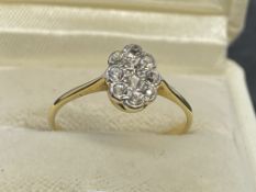 Jewellery: Ladies 18k and platinum art deco diamond cluster, estimated weight 0.50ct, size O. Weight