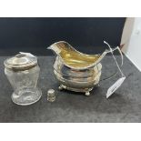 Hallmarked Silver: Milk jug, glass and silver toothpick holder and thimble. Net weight 4.37oz.