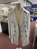 Iconic Elvis Presley Memorabilia: Elvis Presley "A. Jackman" Custom-Made White Leather Coat. This