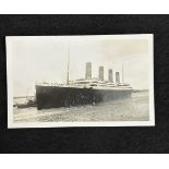 R.M.S. TITANIC: Nautical photograph agency postcard of Titanic leaving Southampton erroneously dated