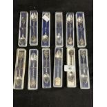 OCEAN LINER: Collection of twelve souvenir spoons from various liners including Canberra, Rotterdam,