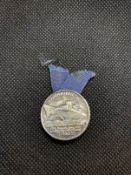 OCEAN LINER: S.S. Normandie souvenir Blue Ribbon pin, circa 1935, a rare piece that was presented to