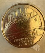 MEDALS/OCEAN LINER: An extremely important 22ct gold Royal Mint presentation medal commemorating the