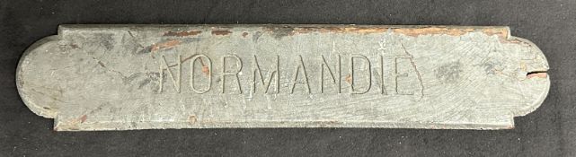 S.S. NORMANDIE: Extremely rare lifeboat nameplate bearing signs of significant exposure to smoke and