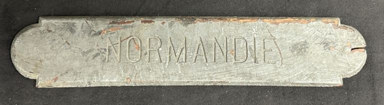 S.S. NORMANDIE: Extremely rare lifeboat nameplate bearing signs of significant exposure to smoke and