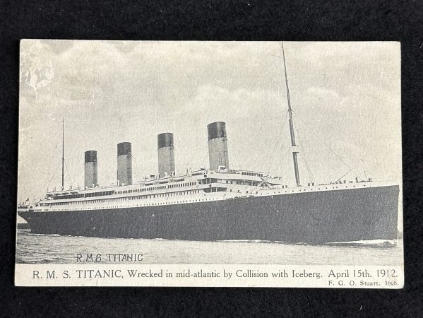 R.M.S. TITANIC: F.G.O. Stuart real photo postcard showing the ill fated liner with unusual mention