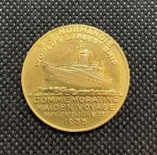 OCEAN LINER: S.S. Normandie. A bronze medal by Jean Vernon in the art deco style, issued to