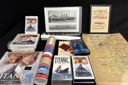 R.M.S. TITANIC: Mixed box of memorabilia including videos, original pages from 1912 newspapers,