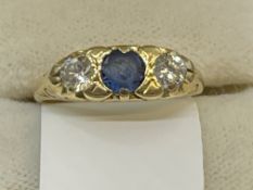 Jewellery: Yellow metal ring set with a circular cut sapphire, estimated weight 0.20ct,