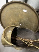Brass and other metalware including coal scuttle, pot, plates, griddles, candlesticks, fire