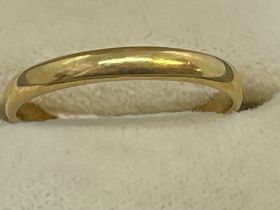 Jewellery: 22ct plain 3mm band, hallmarked London. Ring size K½.