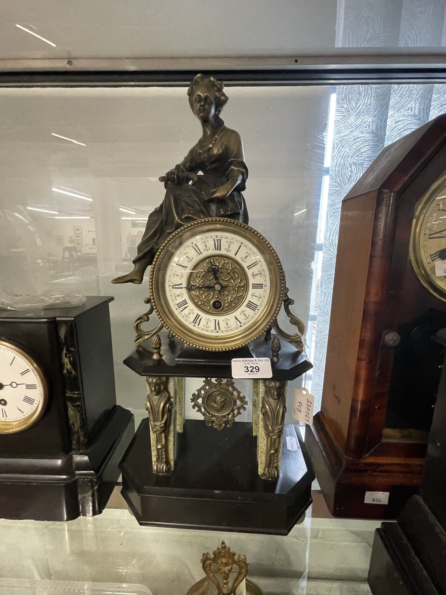 Clocks: 20th cent. Empire style gilt metal, marble and slate clock, unsigned. 19ins.