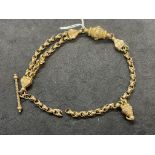 Jewellery: Yellow metal part of a fancy Albert chain, tests as 9ct gold. Length 9ins. 11.8g.