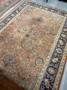 20th cent. Khali rug, salmon and blue ground. Approx. 118ins. x 79ins.