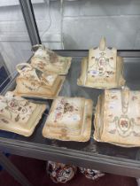 Staffordshire, five Fieldings Crown Devon cheese dishes and a butter dish, one in the Bird of