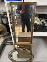 Long upright mirror, 49ins. x 15ins. Large oval mirror metal framed with leaf decoration, 23ins. x