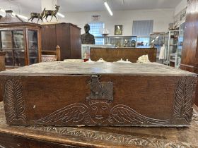 18th cent. Oak church warden's box with angel carved to front. 32½ins. x 9ins. x 17½ins.