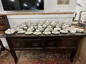 18th cent. Oak and elm serving table, two wide drawers, on four swept supports.