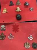 Militaria: Large collection of cap badges, includes four Wiltshire Regiment, York & Lancs