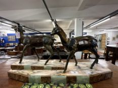 Hollowcast bronze stag and doe red deer on marble base, unsigned but has a retailers label, Maison