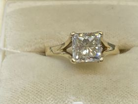 Jewellery: Yellow metal ring, claw set with a princess cut diamond, weight 2.01ct, colour J, clarity