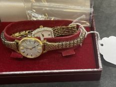 Ladies rotary gold plated watches, one with a rectangular dial and one with a round dial. (2)