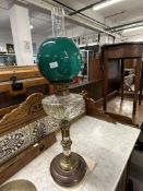 Late 19th/early 20th cent. Pedestal oil lamp, copper base with brass pedestal, clear glass reservoir