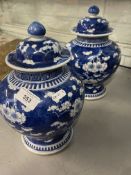 Oriental Ceramics: 19th cent. Chinese storage jars with covers, cobalt blue decorated with prunus