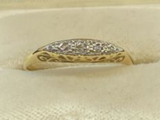 Jewellery: Yellow metal ring set in white metal with three eight cut diamonds, estimated weight