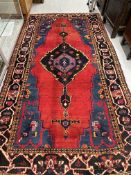 20th cent. Persian (Turkey), red ground, one central Gul, four borders all decorated with