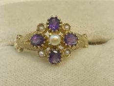Jewellery: 9ct gold ring set with five seed pearls and four amethyst, estimated weight