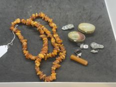 Jewellery: Necklet of unpolished amber, approx. length 38ins. Plus two oval trinket boxes