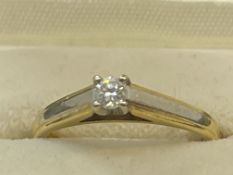 Jewellery: 18ct gold ring set with a brilliant cut diamond, estimated weight 0.10ct. Hallmarked