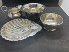 Hallmarked Silver: Shell butter dish, two sugar bowls and a cream jug, various hallmarks.