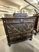 18th cent. Oak chest of 4 drawers on bun supports, moulded decoration. 40ins. x 38½ins. x 25ins.
