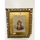 Watercolour, portrait of a young man wearing a hat, signed lower right G. Facciola. Giltwood
