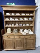 19th cent. Pine dresser three shelf unit above three drawer and cupboard base. 86ins. x 62ins. x