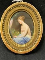 19th cent. Ceramic oval miniature of a wood nymph holding a butterfly, framed.