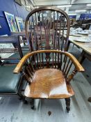Antiques: 18th/19th cent. Elm and yew hoop back Windsor chair with crinoline stretcher.