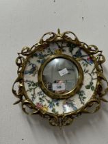 Royal Staffordshire Clarice Cliff birds plate mounted in a gilt frame with convex mirror. Dia.