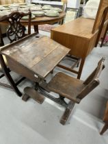 Late 19th/early 20th cent. Oak child's flip top school desk and integrated chair.