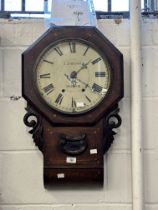 American hardwood cased wall clock with fruitwood inlays. Retailed by J Johnson Preston 26ins.